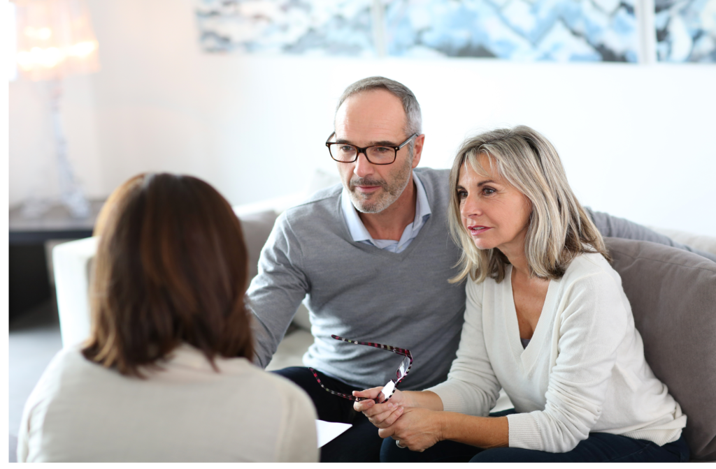 Elderly couple having a meeting about retirement